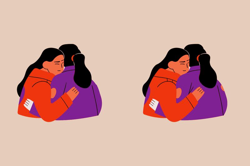 dos amigas abrazándose,