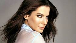 Captan a Sandra Bullock en el lugar más feliz del mundo con sus dos hijos