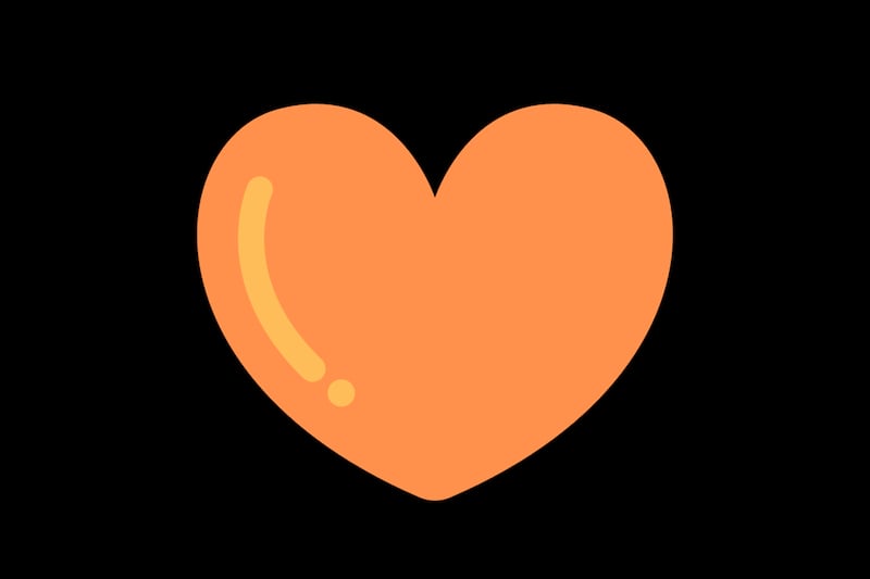 Corazón naranja sobre un fondo negro.