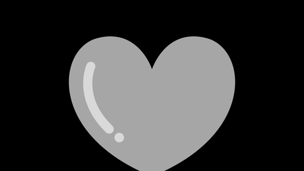 Corazón gris sobre un fondo negro.