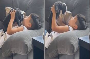 VIDEO: Niño le canta amorosamente a su perrito mientras lo abraza y se hace viral
