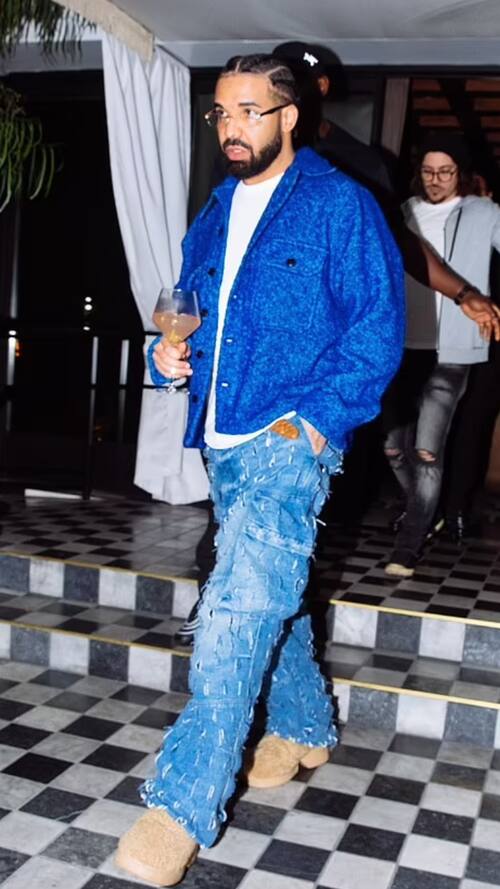 El rapero canadiense saliendo de la misma fiesta en la que se encontraba Shakira