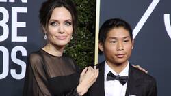 Angelina Jolie inculca el ejercicio a su hijo Pax, fue captado luciendo su trabajado cuerpo