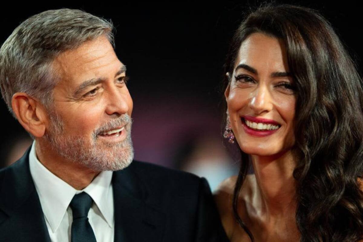 George Clooney y su esposa Amal La pareja desea tener buena relación con el rey Carlos III - Créditos: Archivo